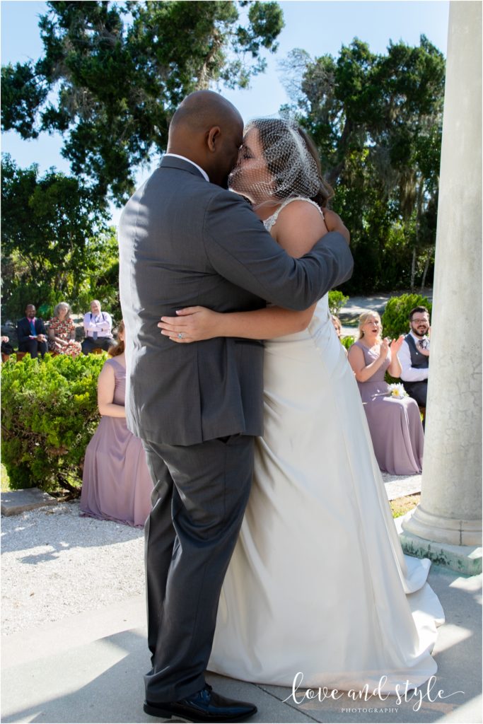 Historic Spanish Point Wedding, bride and groom kissing at the ceremony