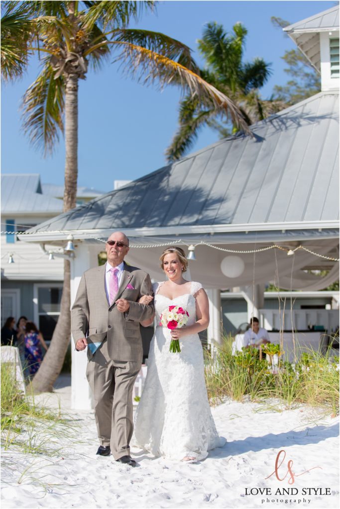 Anna Maria Island Wedding Photography at The Sandbar Restaurant, bride walking down the aisle