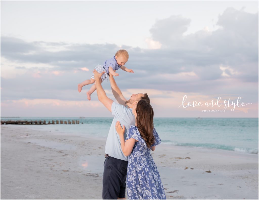Photographer on Anna Maria Island with a family of 3 at Coquina Beach Park at Sunset
