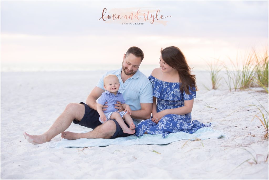 Photographer on Anna Maria Island with a family of 3 at Coquina Beach Park at Sunset