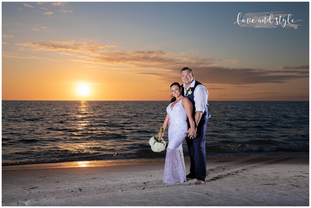 Wedding Photography at The Beach House bride and groom on the beach at sunset