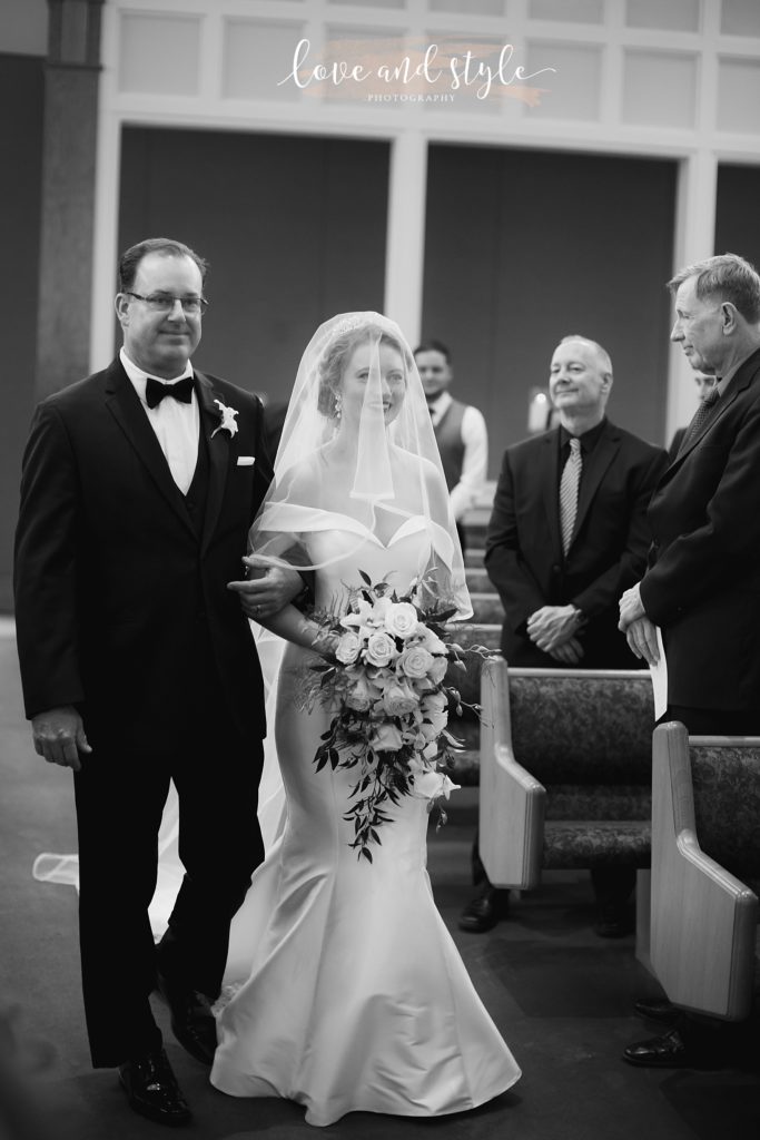 A father walking his daughter down the aisle for her Gorgeous Sarasota Wedding