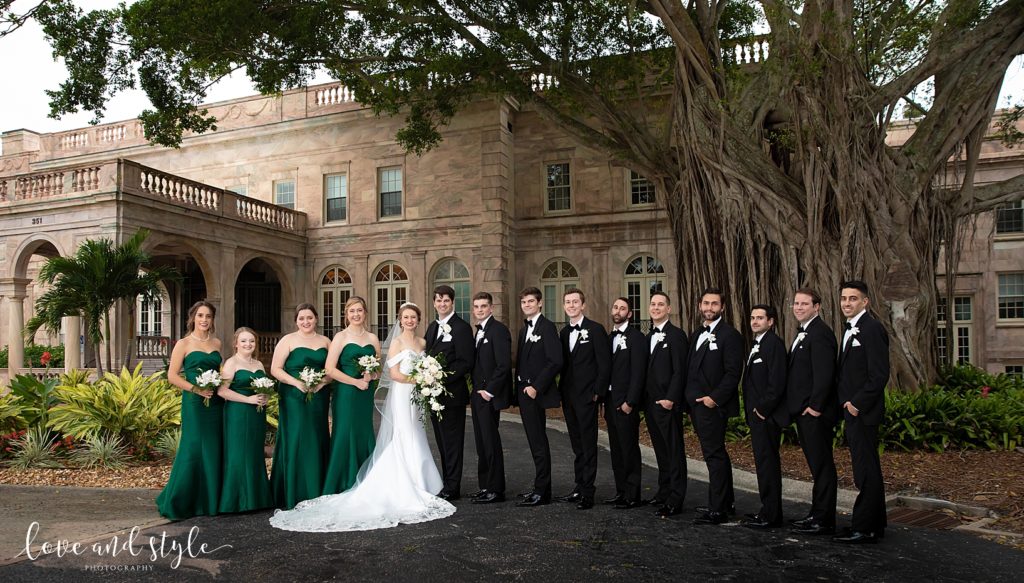 Bride and Groom with their wedding party in front of the New College after their Gorgeous Sarasota Wedding