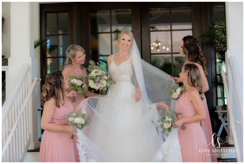 Bride with her bridesmaids Sarasota Wedding at The Founders Club