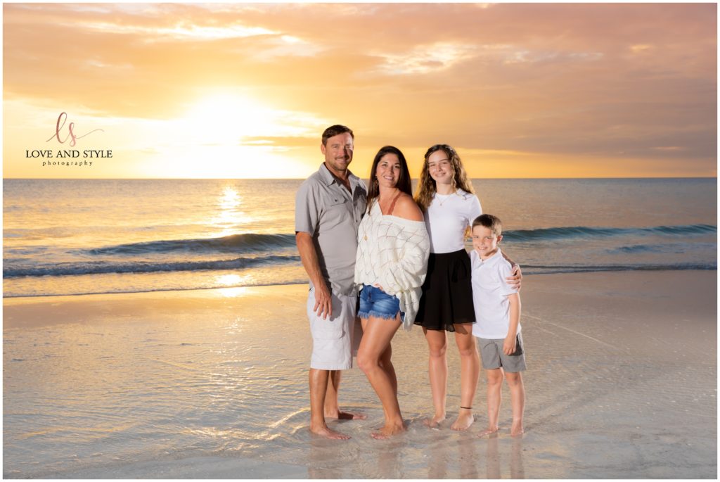 Family photo on Anna Maria Island, Florida at sunset