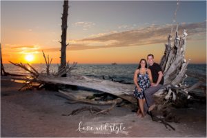 Engaged couple at sunset on Beer Can Island