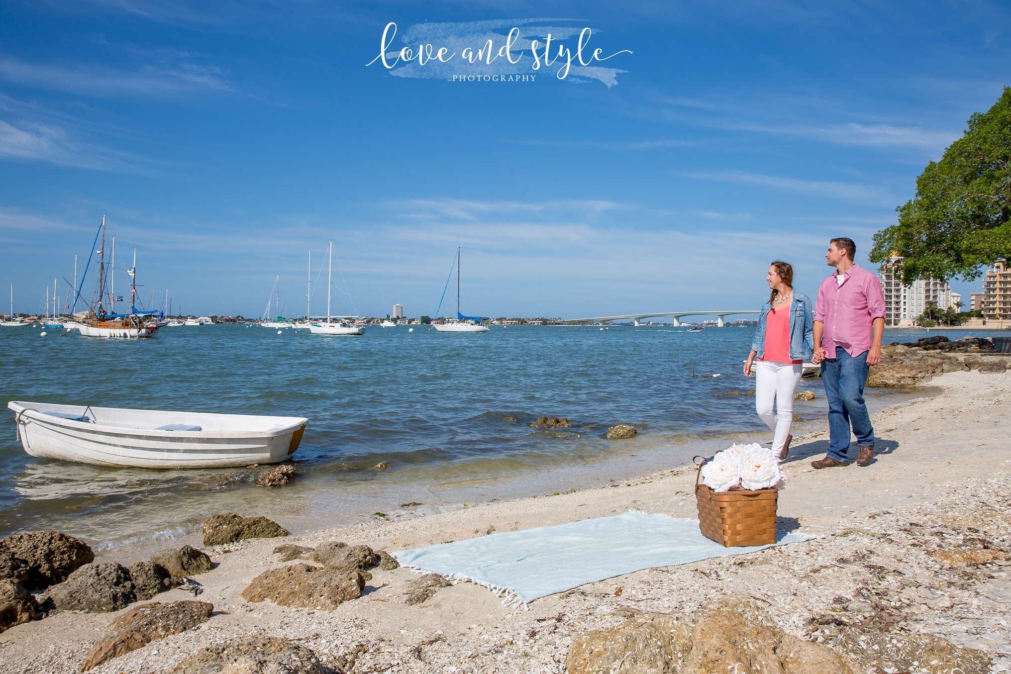 Sarasota Engagement Photography at Bayfront Park in the morning with the couple having a picnic on the beach
