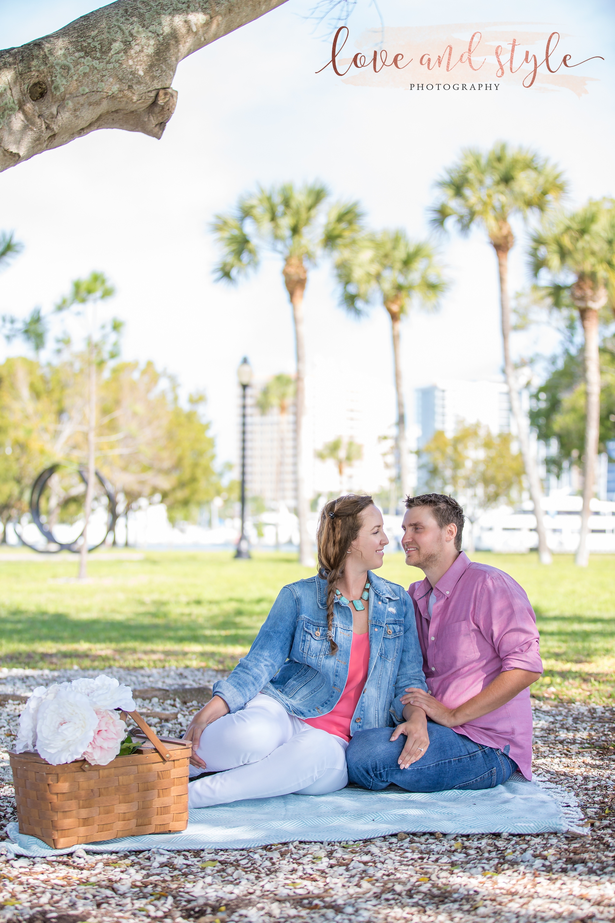 Sarasota Engagement Photography at Bayfront Park in the morning with the couple having a picnic