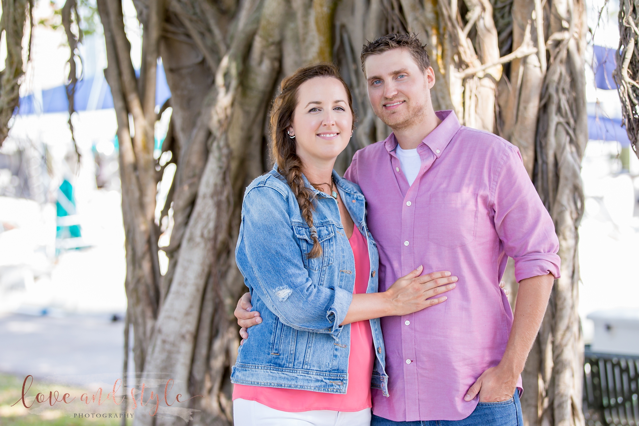 Sarasota Engagement Photography at Bayfront Park in the morning with the couple under a tree