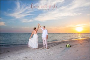 Lido Beach Wedding bride and groom dancing on the beach at sunset