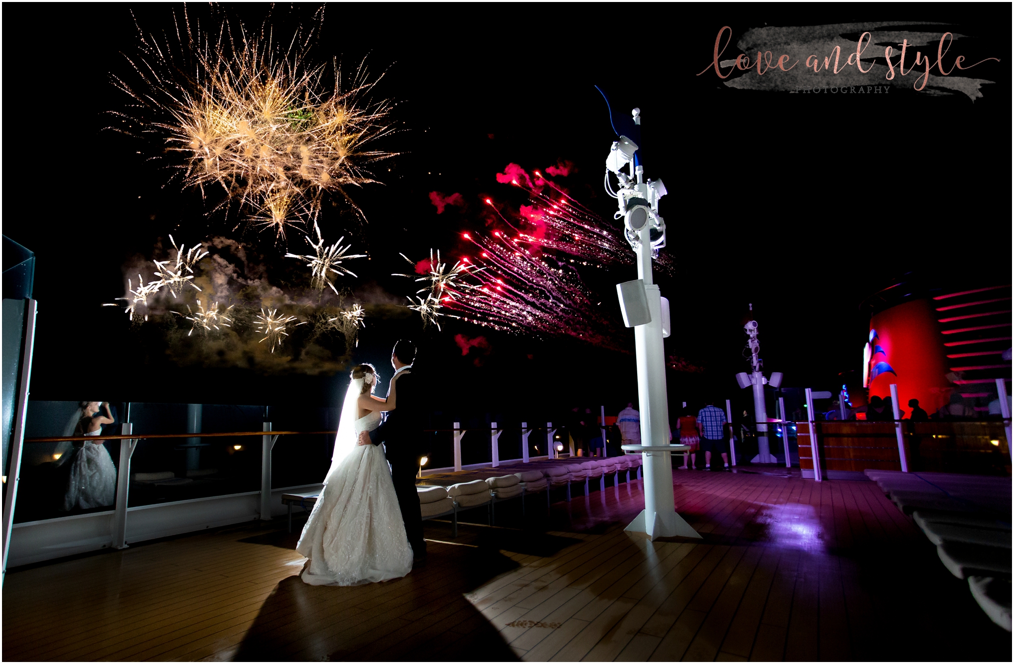 Disney Dream Cruise Wedding Photography, bride and groom watching the fireworks