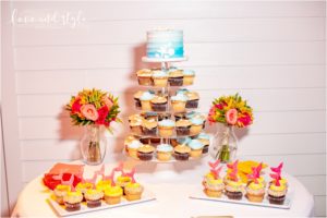 Beach House Wedding Cake and cupcakes