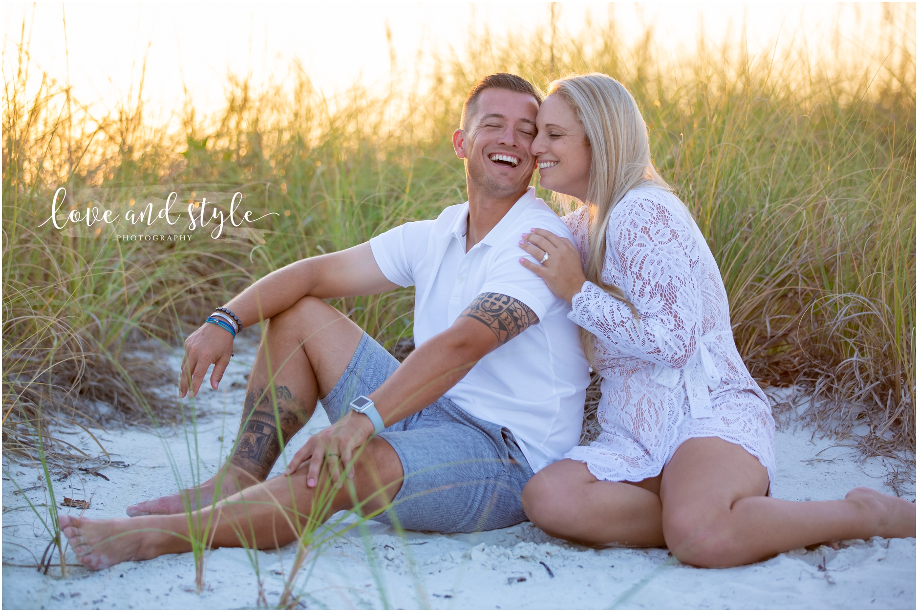 AMI Engagement Photography with couple in the seagrass at the beach during the sunset hour