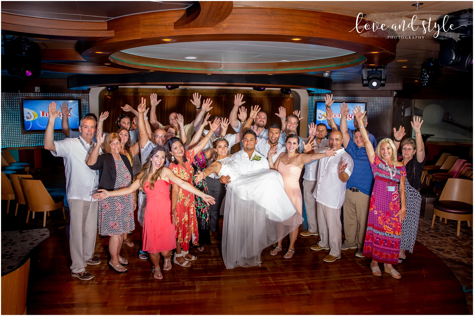 Disney Cruise Wedding Reception group photos with all the guests in the D Lounge