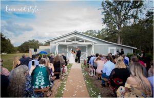 Sarasota Wedding Photographer at The Barn at Chapel Creek wide angle of the ceremony