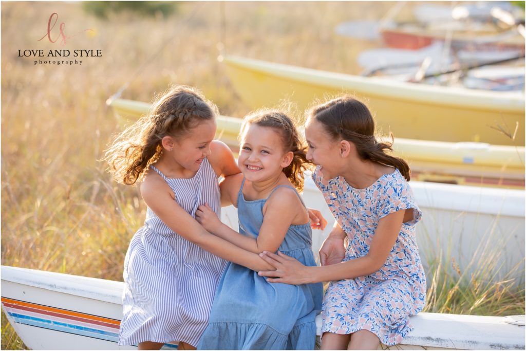 Siesta Key Family Photographer , portrait of the 3 sisters laughing