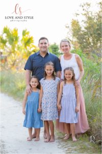 Siesta Key Family Photographer at sunset with a family of five on the beach path