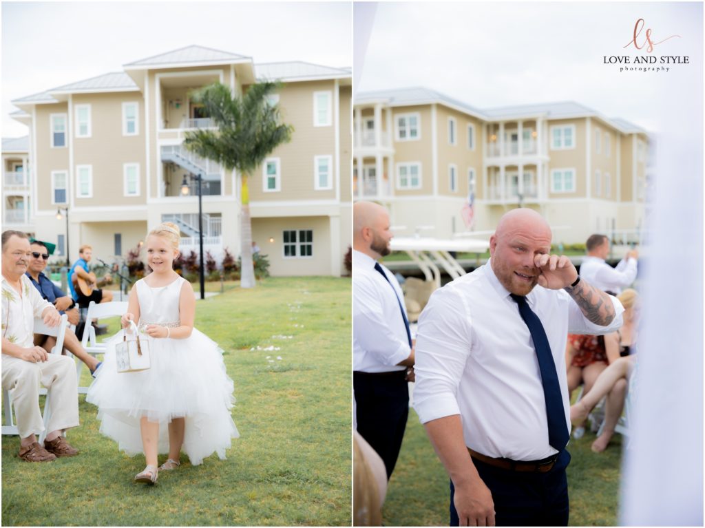 Groom's reaction with tears as his daughter and flower girl walks down the aisle