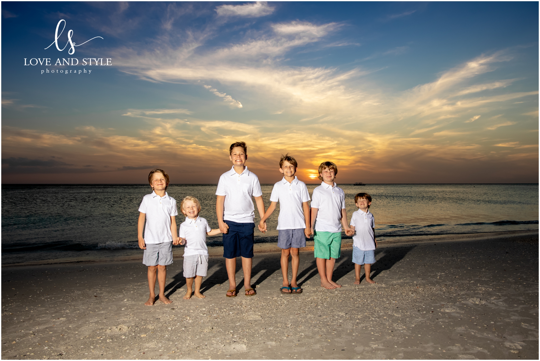 Family Photographer Anna Maria Island with the kids at sunset