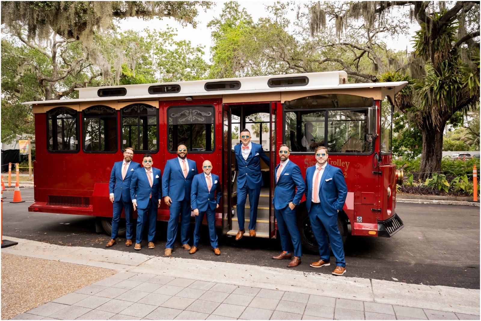 Groom and groomsmen aboard the Siesta Trolley in front of Marie Selby Gardens in Sarasota