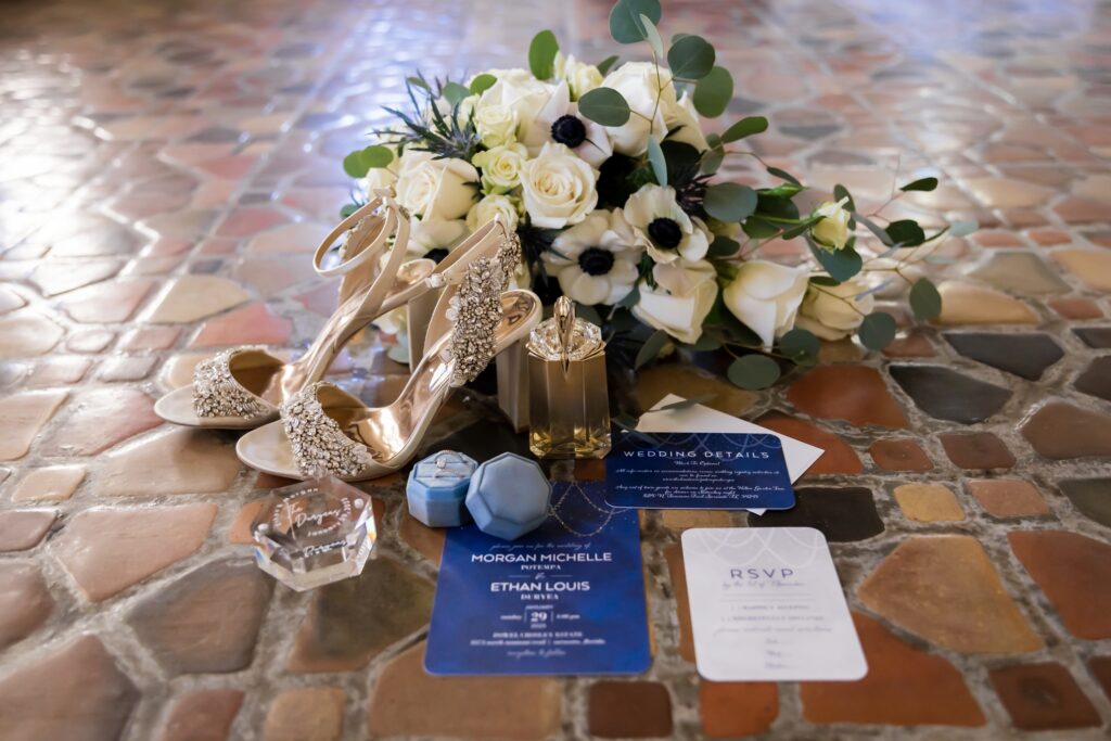 Wedding details such as flowers, shoes and invitations.
