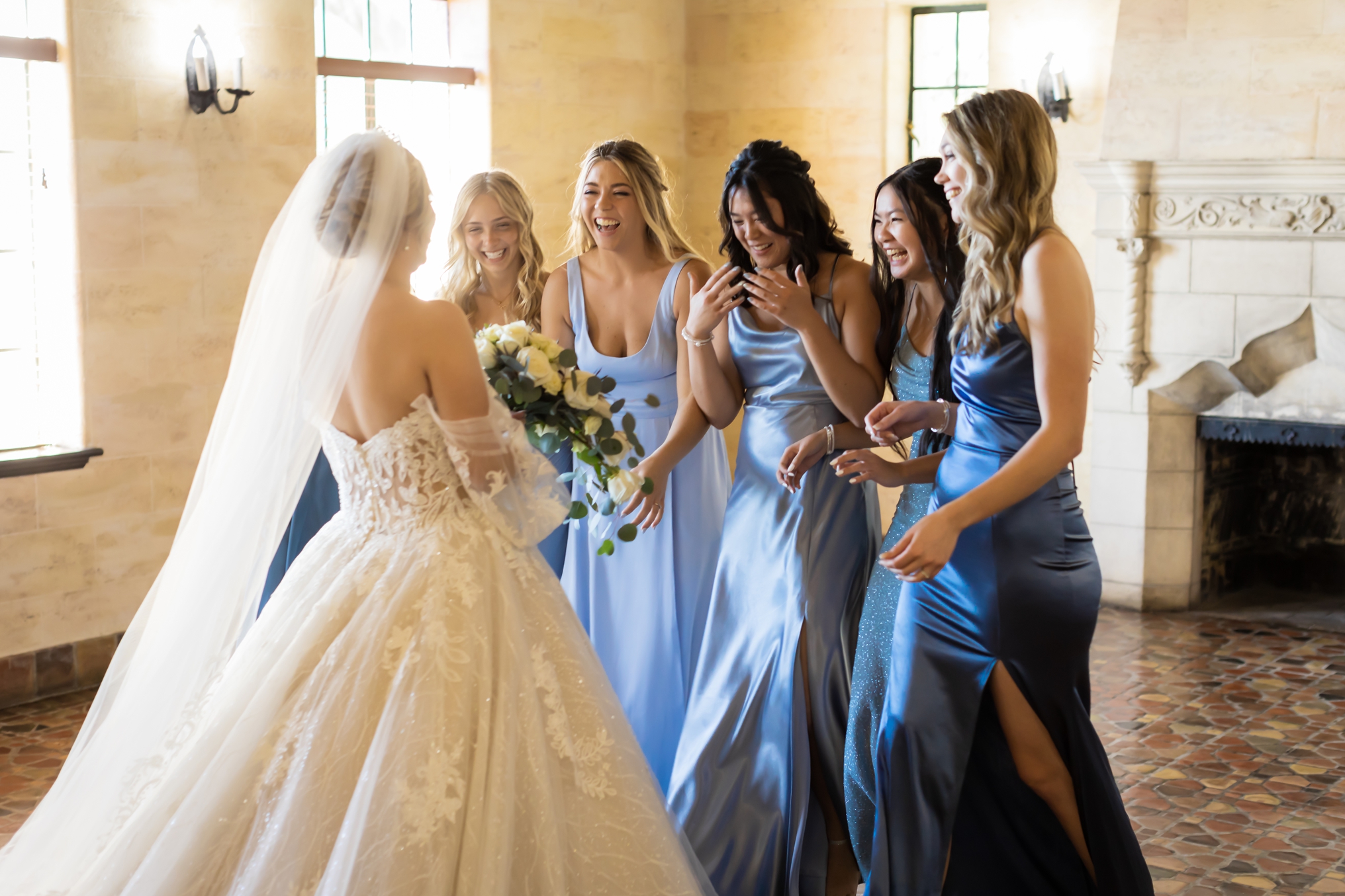 Bride doing a first look with her bridesmaids at the Powel Crosley Estate